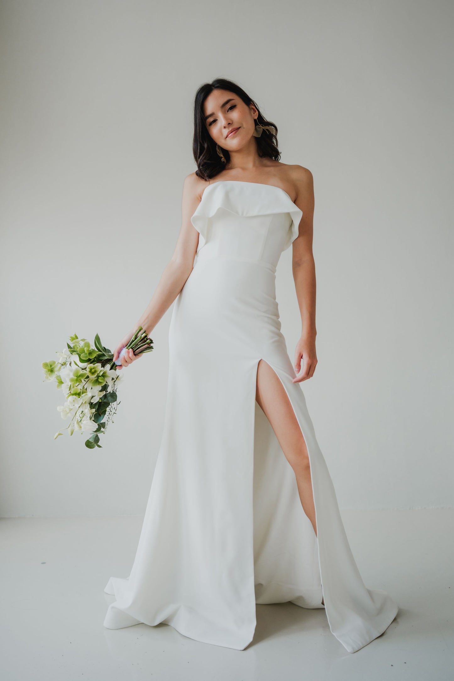 Olivia Frilly Strapless Crepe Minimal Wedding Dress | Column Sheath Skirt with Slit | Bone and Grey Bridal | Minimal wedding dresses online Canada Singapore USA