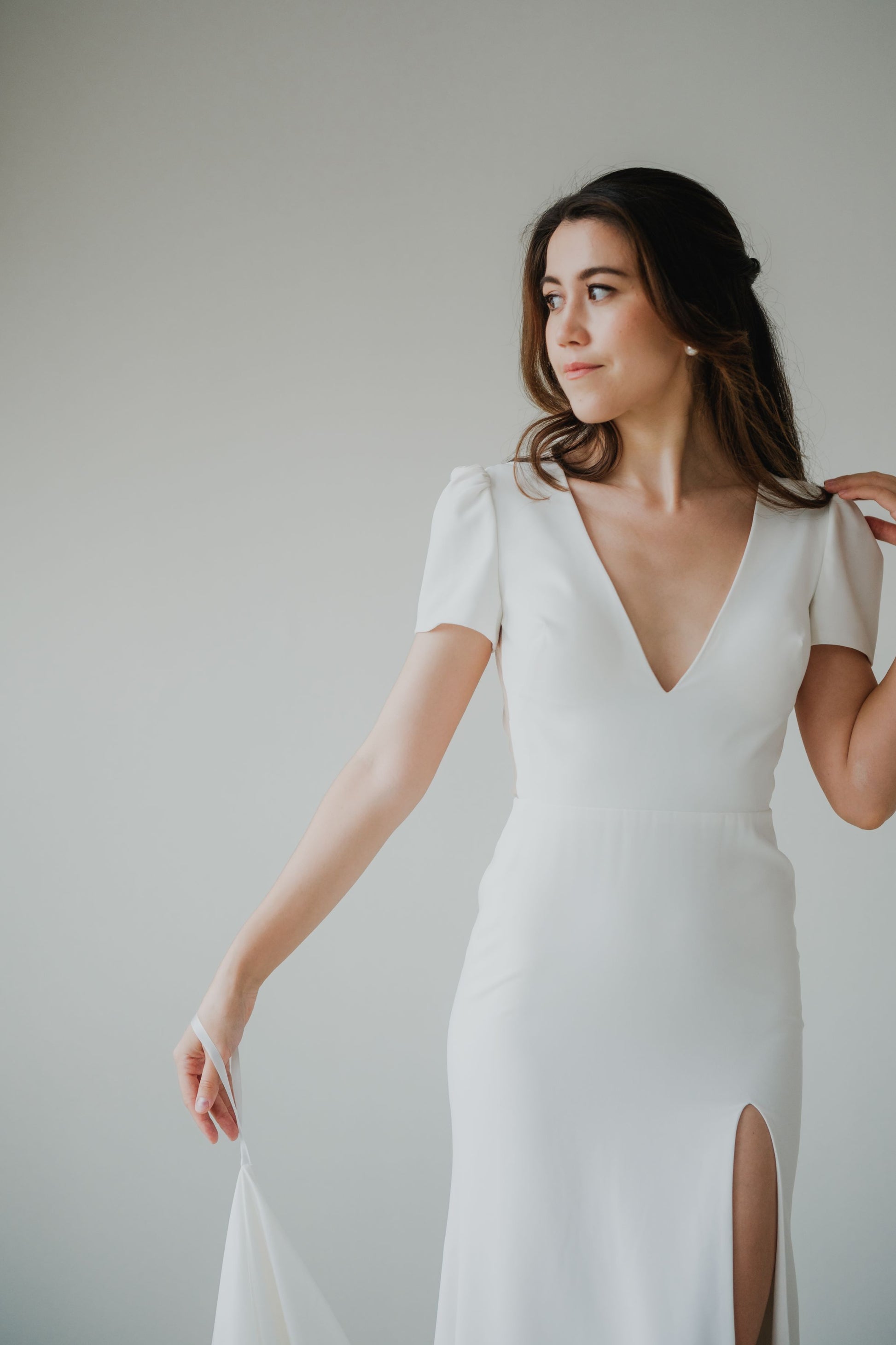Yvette Plunging V-neck Short Cap Sleeves Column Wedding Dress | Low V back with Nude Mesh Column Sheath Skirt | Bone and Grey Bridal | Minimal wedding dresses online Canada Singapore USA