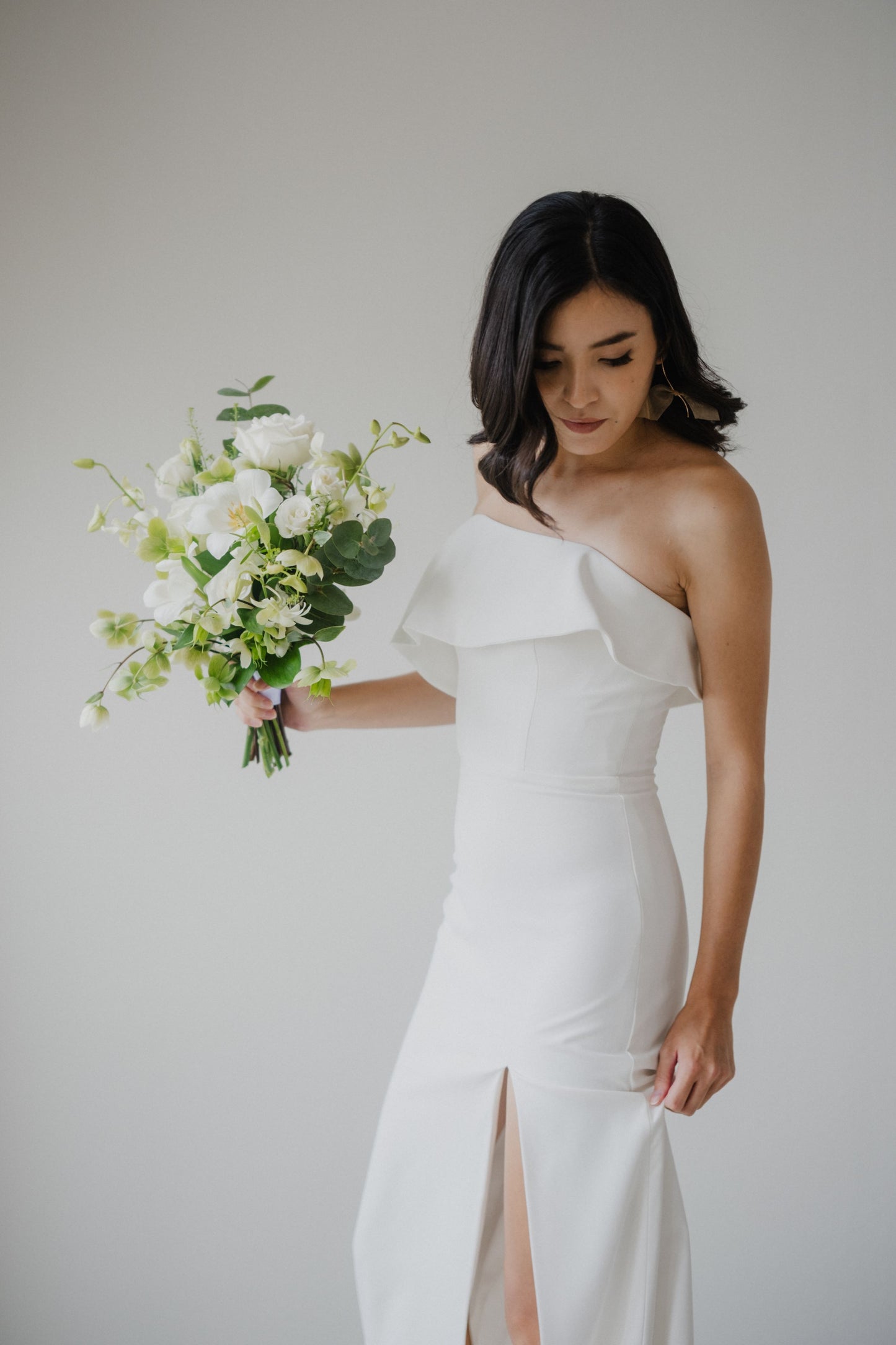 Olivia Frilly Strapless Crepe Minimal Wedding Dress | Column Sheath Skirt with Slit | Bone and Grey Bridal | Minimal wedding dresses online Canada Singapore USA