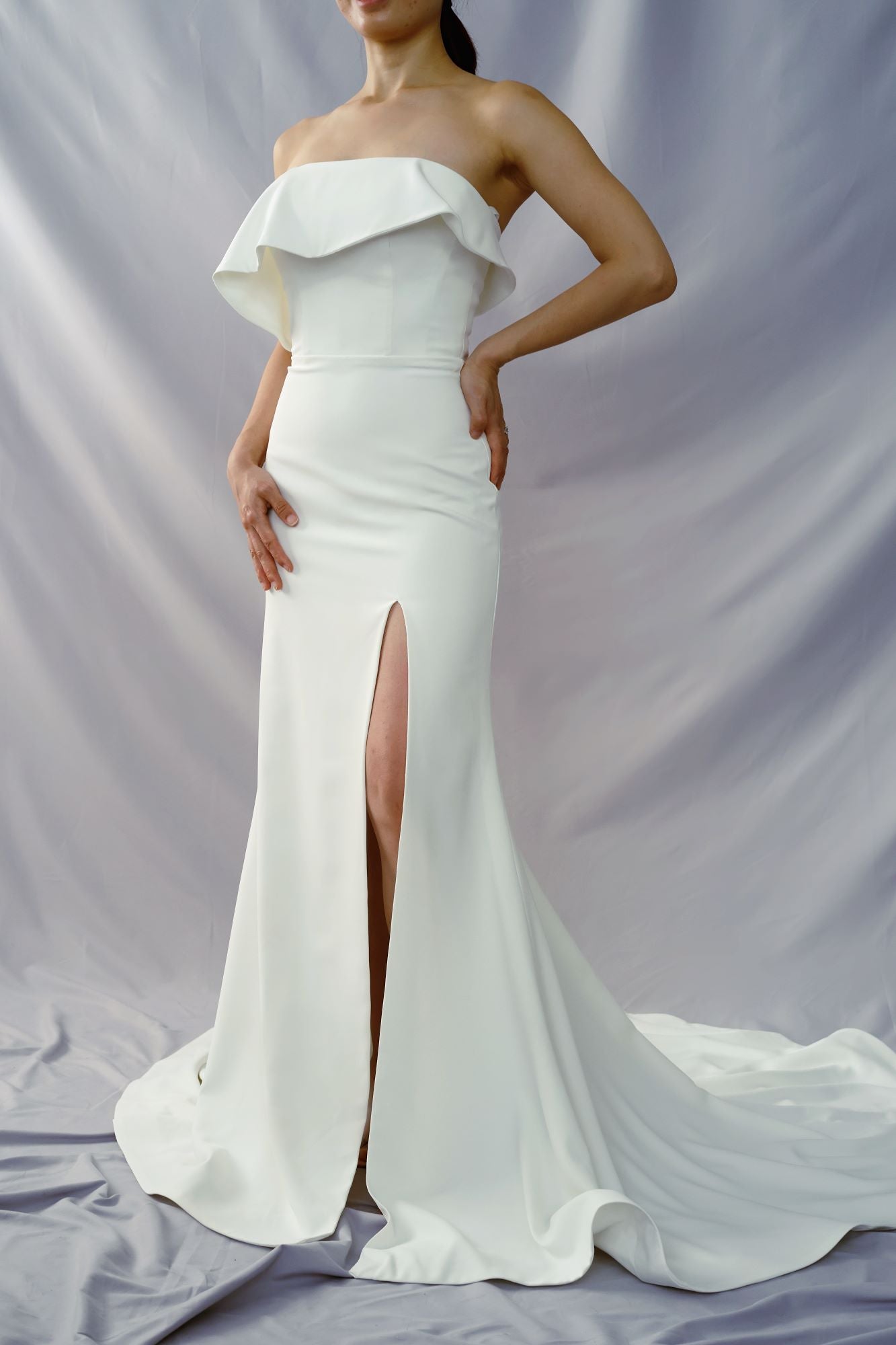 Olivia Frilly Strapless Crepe Minimal Wedding Dress | Column Sheath Skirt with Slit | Bone and Grey Bridal | Minimal wedding dresses online Canada Singapore USA