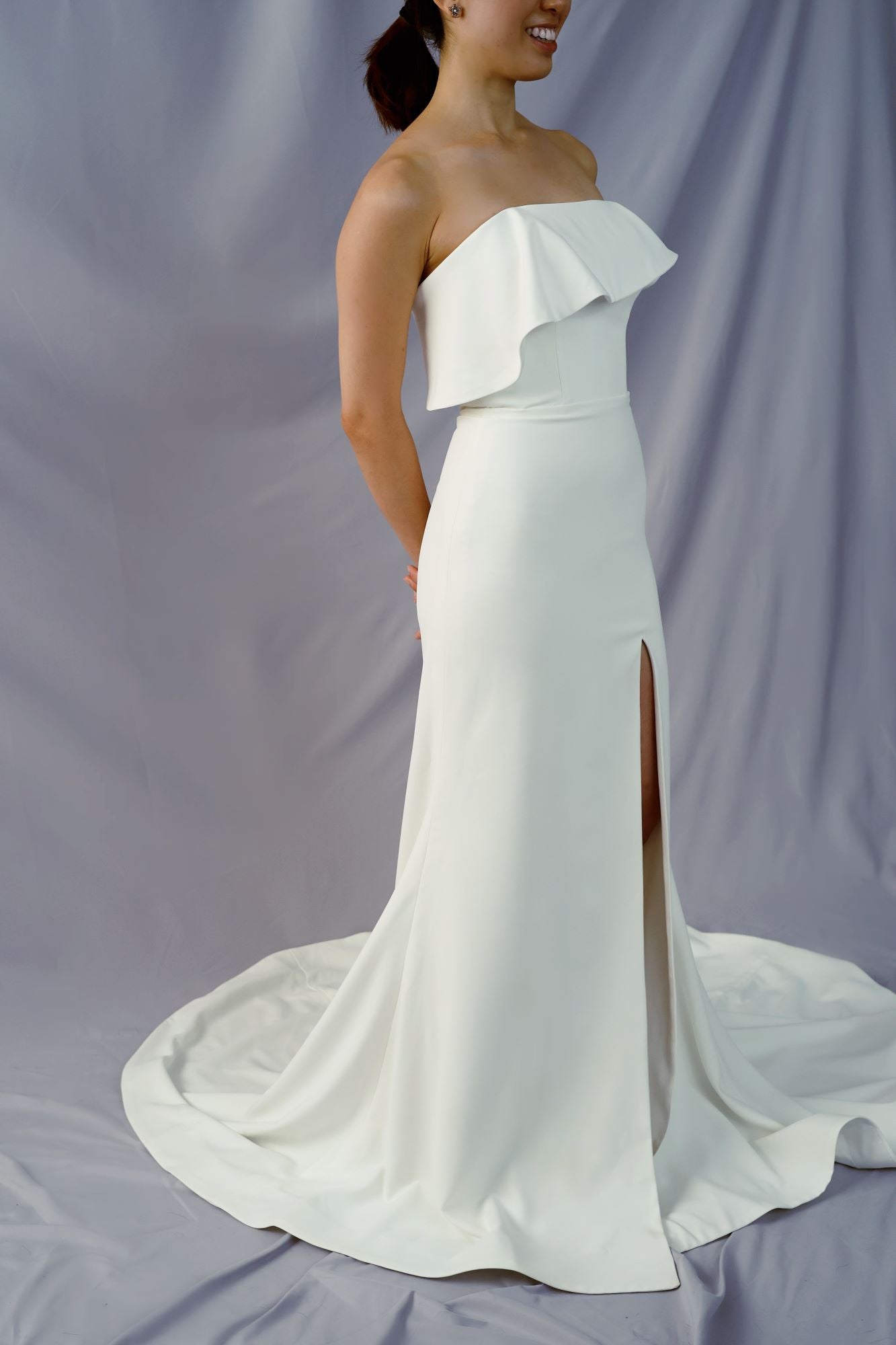 Olivia Frilly Strapless Crepe Minimal Wedding Dress | Column Sheath Skirt with Slit | Bone and Grey Bridal | Minimal wedding dresses online Canada Singapore USA