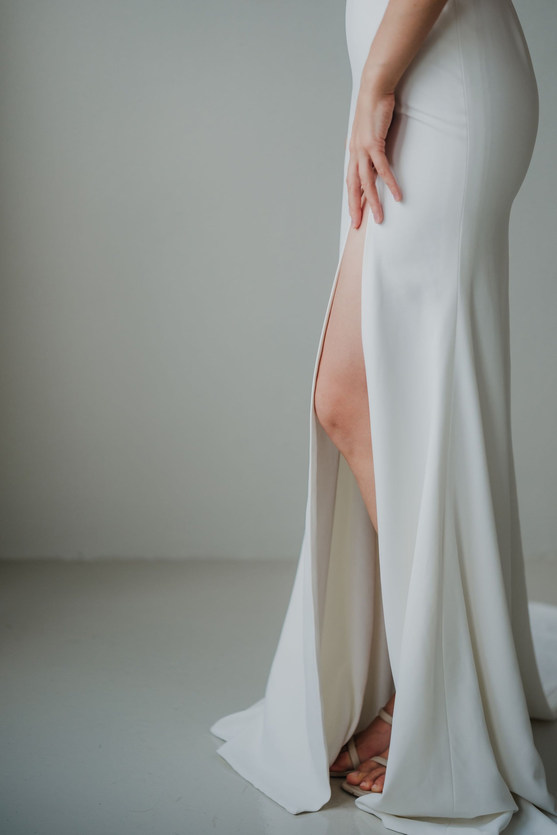 Yvette Plunging V-neck Short Cap Sleeves Minimal Wedding Dress | Low V back with Nude Mesh Column Sheath Skirt | Bone & Grey Bridal